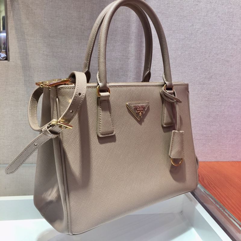 Pra*a top handle bags